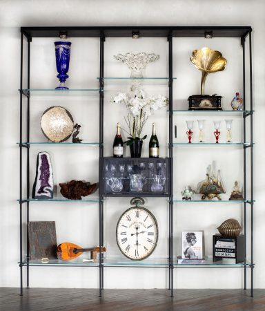 Wolf Aspen Series floor-mounted metal and glass shelving displaying art and collected objects