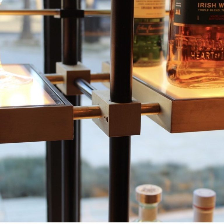 Wolf Custom Brass Shelf Connection custom machined brass shelf connection with concealed wiring for integrated lighting